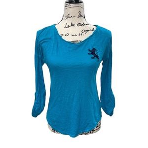 Express turquoise blue t-shirt featuring roll tab long sleeve